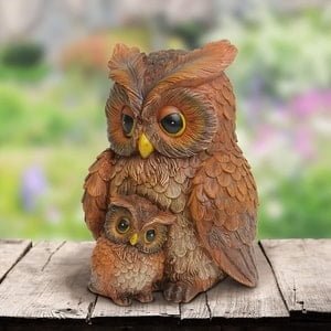 mother owl and owlet statue with soft light for garden