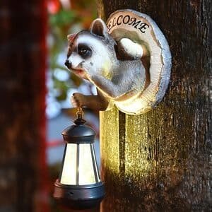 hanging outdoor lamp with raccoon decoration