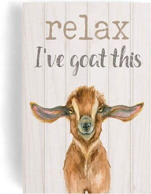 goat shoulders and head painted on wood with text Relax I've Goat This above the head